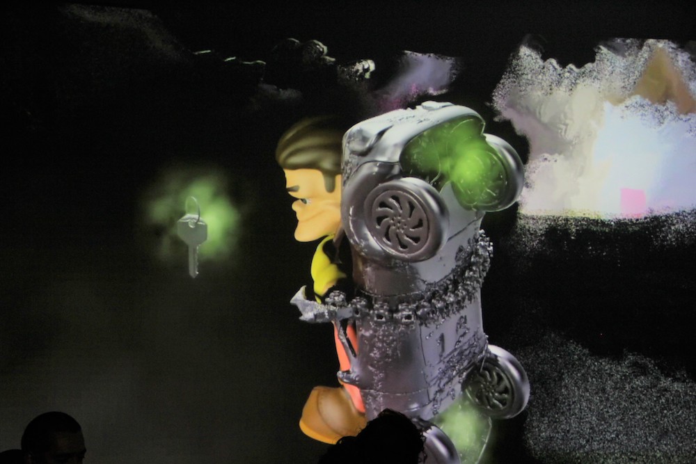 車と鎖で括りつけられた男らしきもの